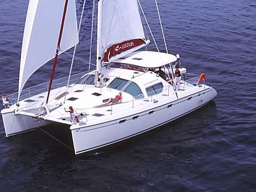 Book a boat for rent in Portocolom, Spain for up to 6 guests - the Magick II catamaran.