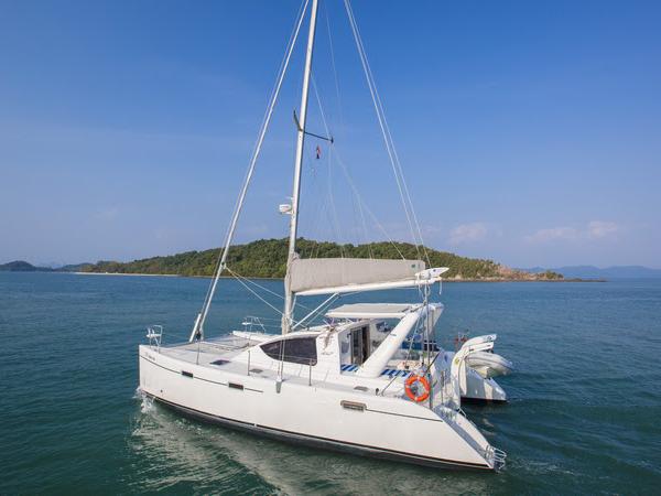 Sail around Seychelles on a catamaran for rent - the amazing Faith boat and discover sailing.