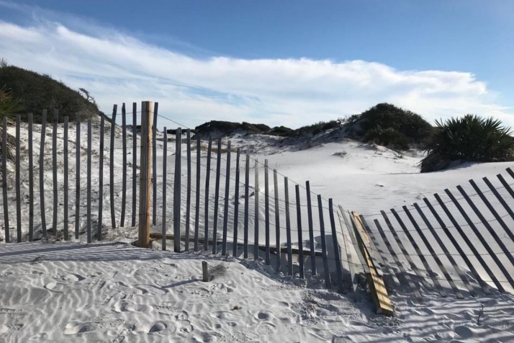 broken fence on greyton beach state park