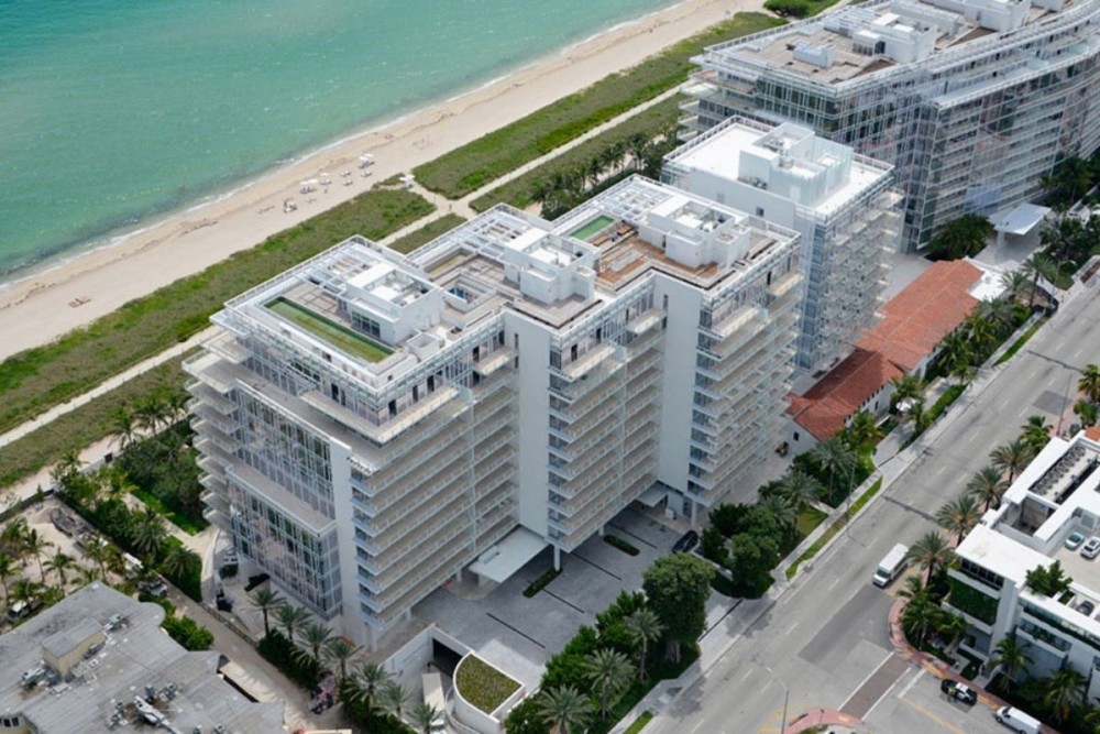 four seasons hotel buildings near the ocean and beach