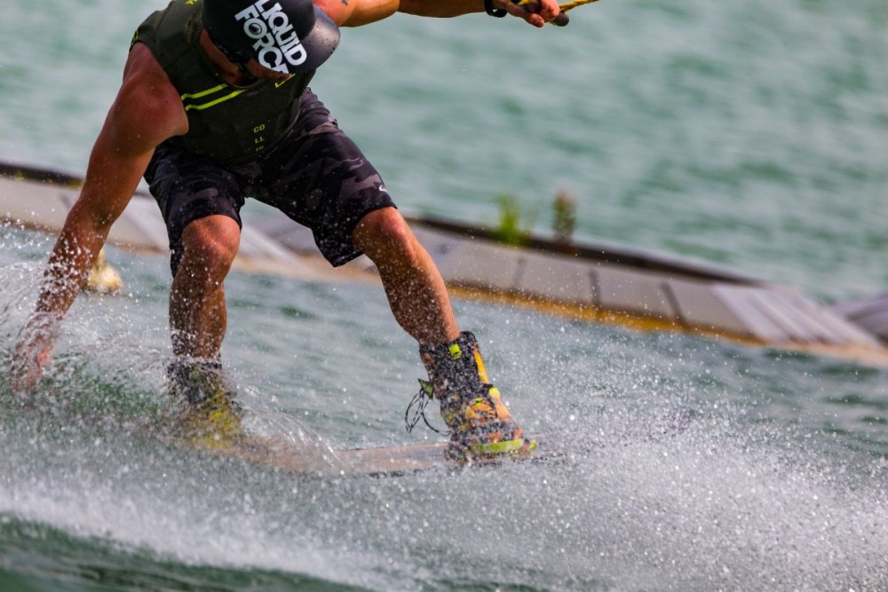 a person wakeboarding on the waves